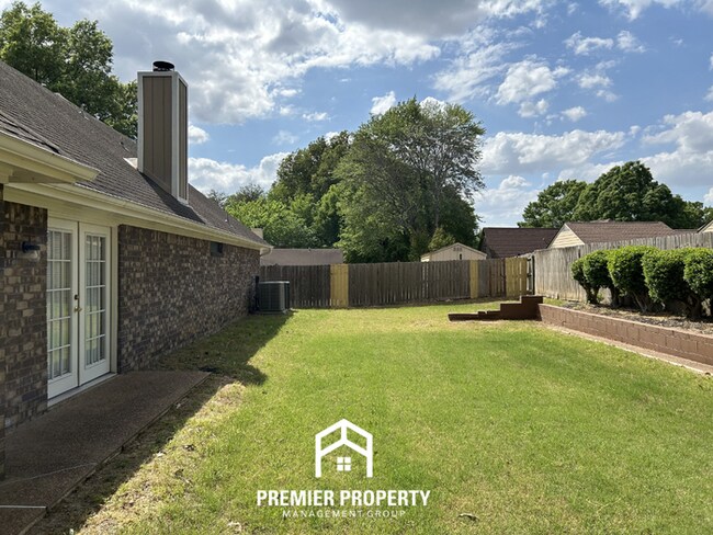 Building Photo - Massive 5BR/3BA Estate in 38125 | 2,700+ SQ FT, Vaulted Ceilings & Tile Floors