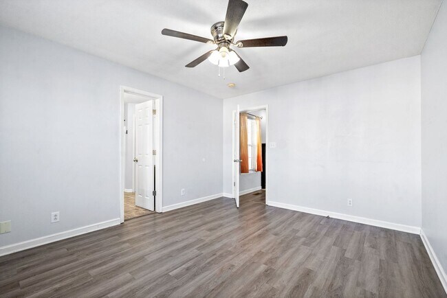 Building Photo - Adorable home with fenced back yard coming...