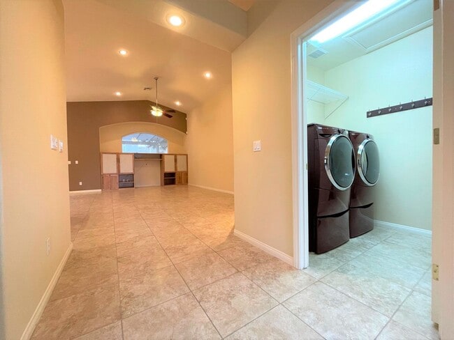 Building Photo - Vaulted Ceiling single-story home in a gat...