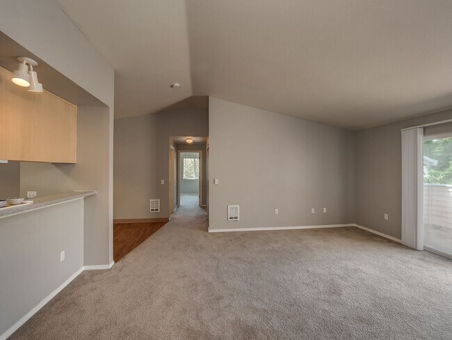 Building Photo - Spacious 3 Bedroom, 2 Bath Apartment with Washer & Dryer, Private Patio & Garage Options!