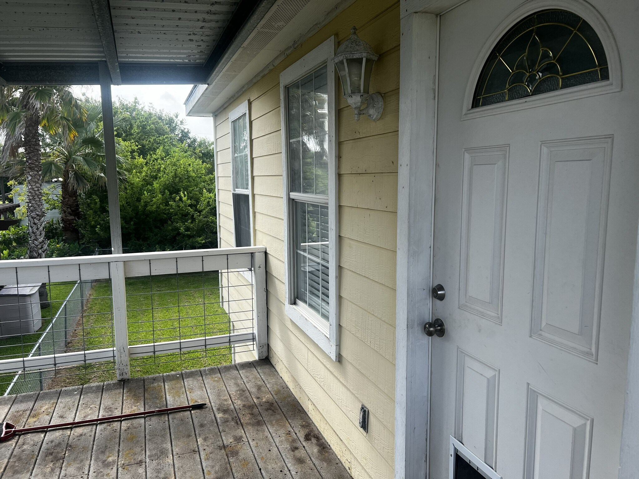 Entrance with covered porch - 233 13th St