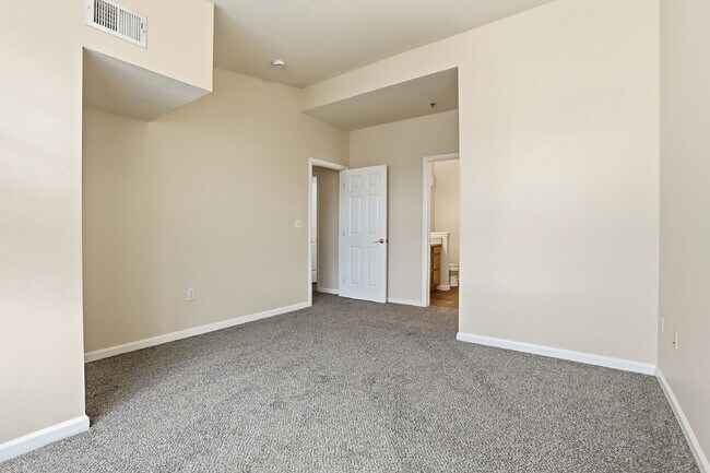 Building Photo - $1,690.95, 2-bed, 2-bath condo in a gated community with a washer/dryer.