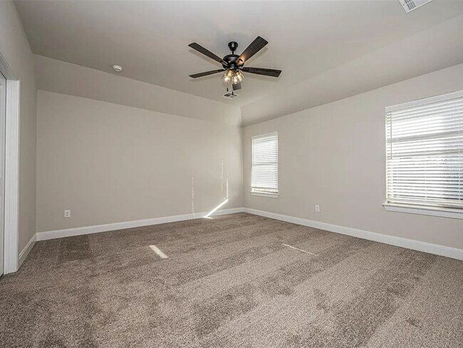 Building Photo - 4-Bed Home with Storm Shelter & 2-Car Garage in Mustang