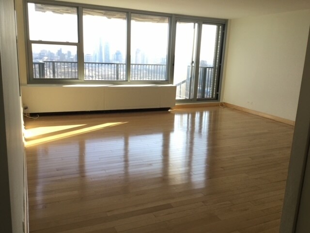 Living room hard wood floors throughout - 400 E Randolph St