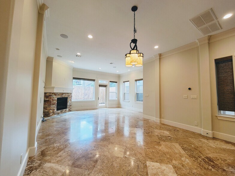 Open dining and living. - 6121 Hamman St