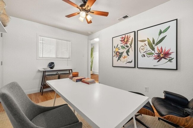 Building Photo - Welcome to this stunning 4-bedroom, 2-bath...