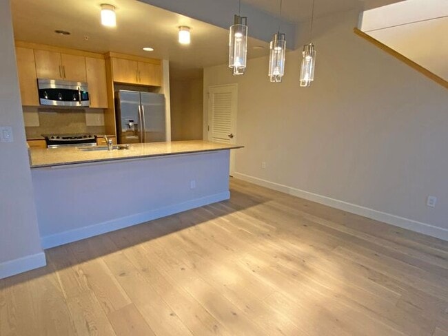 Building Photo - Live at The Axis High-Rise! Upscale, Urban...