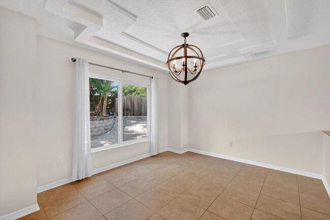 Building Photo - Available Now! Waterfront Living at Its Best – Pool, Decks & Gated Privacy