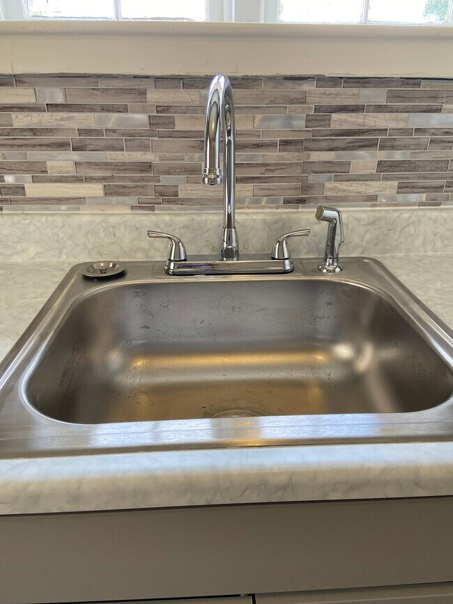 New sink and faucet - 3651 Campfield Rd