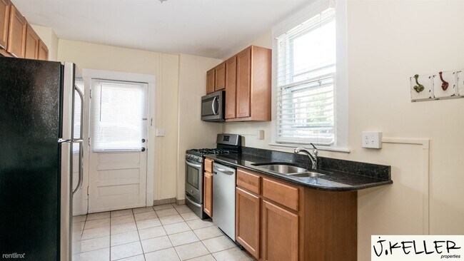 Building Photo - 4 br, 2 bath House - 221 W Mosley St