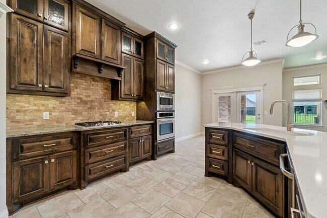 Building Photo - Upscale Comfort Meets Everyday Functionality in This Stunning 3-Car Garage Home!