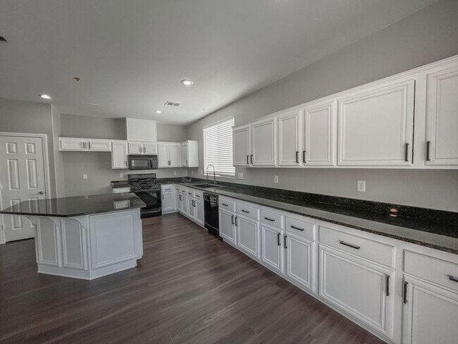 Building Photo - Stunning 5-Bedroom Home in Gated Community...