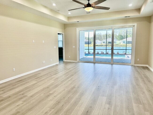 Building Photo - Gorgeous Home with a Private Pool Ready to...
