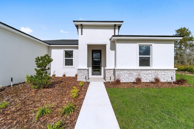 Building Photo - New home located off of Marion Oaks Pass f...