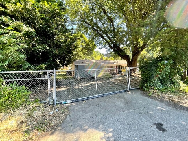 Building Photo - Updated Ranch with Large Fenced Yard, Tucked Off Walker Road~ Gas Fireplace~ Great Natural Light~...