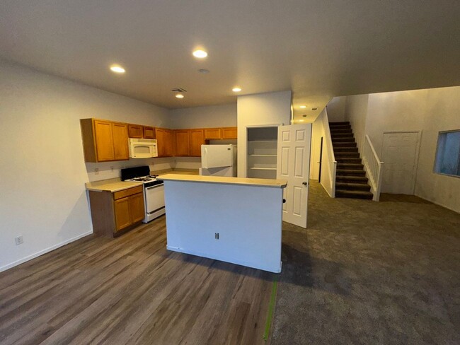 Building Photo - Fresh Paint/New Flooring all inside! Four ...