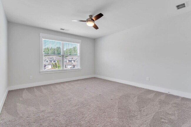 Building Photo - Elegant 3 Bed / 2.5 Bath Luxury Townhome + Bonus Room in Indigo Pointe with Main-Level Primary Su...