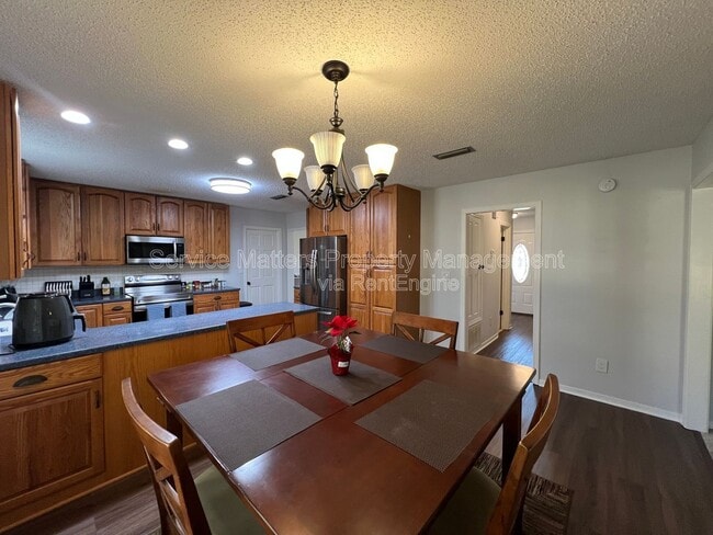 Building Photo - 6004 Players Pl