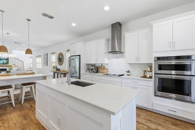 Building Photo - Luxury 5-Bedroom Residence in Eagle Creek with Indoor-Outdoor Living