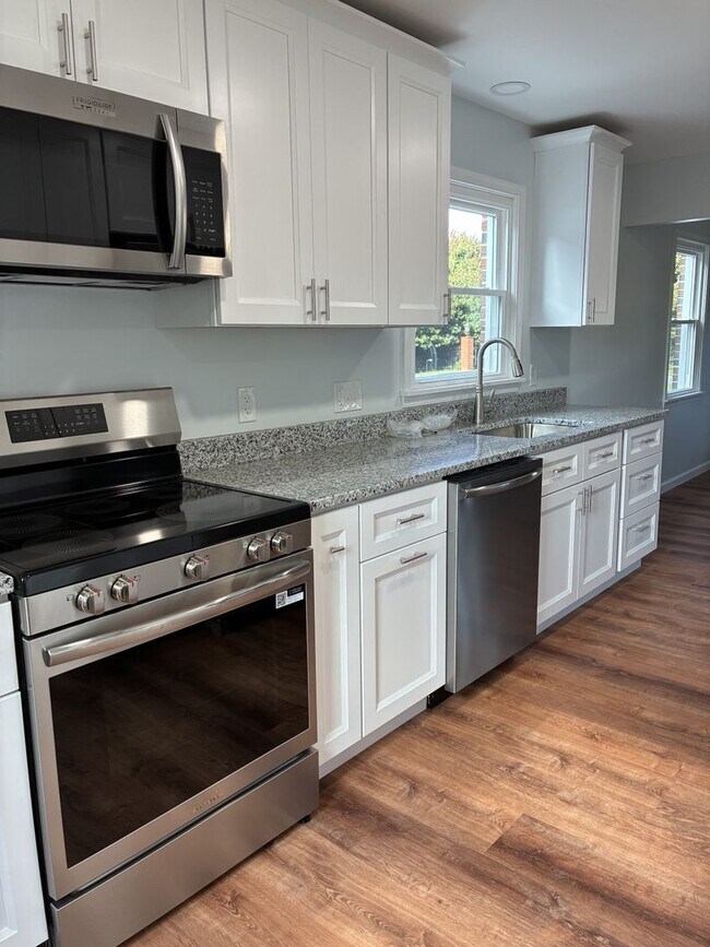 Building Photo - Two Full Living Areas — One Incredible Hom...