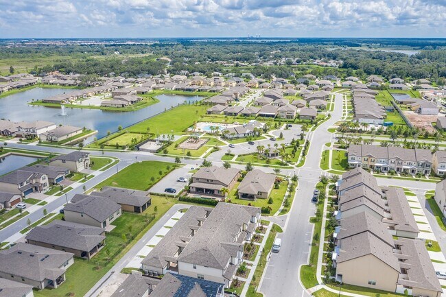 Building Photo - MOVE IN SPECIAL- Energy Efficient 3/3 Townhome w/ 2 Car Garage Near Lake Nona