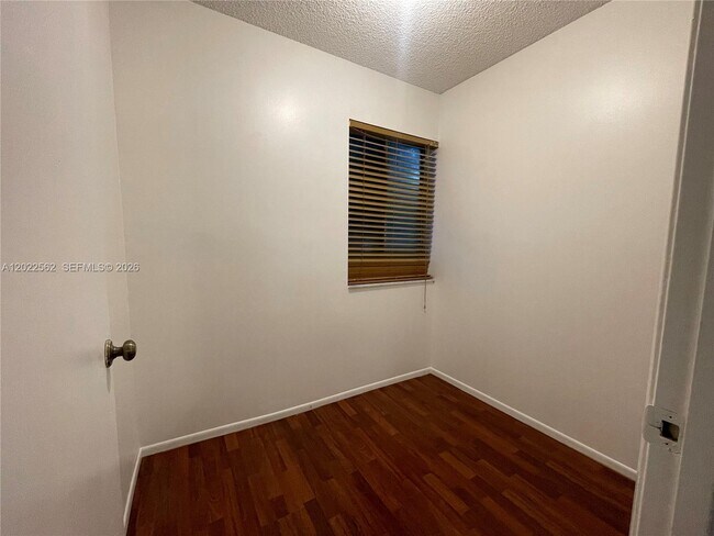 Building Photo - 303 Gardens Dr