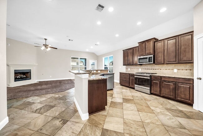 Building Photo - Welcome to this well-kept, single-story gem located in the Villas of Mia Lago!