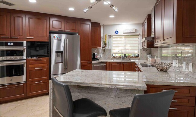 Building Photo - 4957 NW 93rd Doral Pl