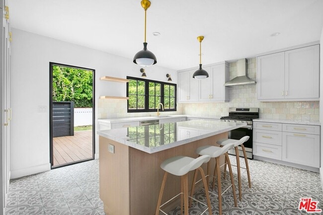 Building Photo - 10525 Cushdon Ave