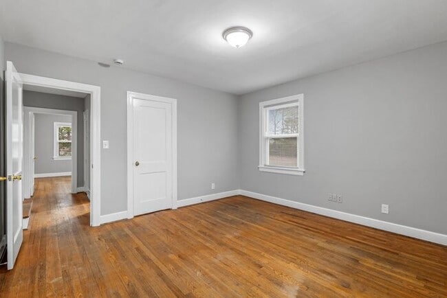 Building Photo - Brick home, Two Story, Hardwoods, DR, 2 Sun Rooms, FP, Carport!.