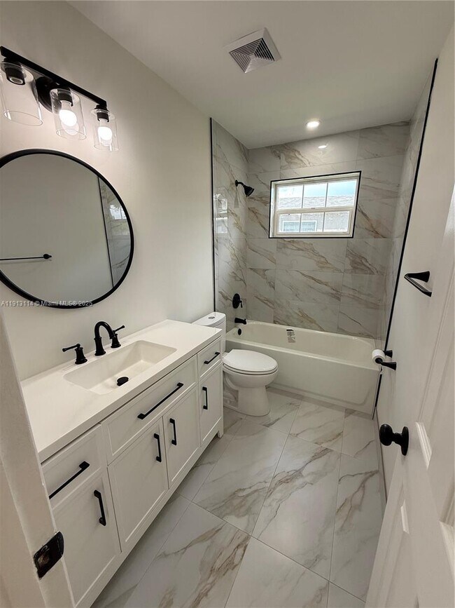 Building Photo - 6570 NW 6th Ct