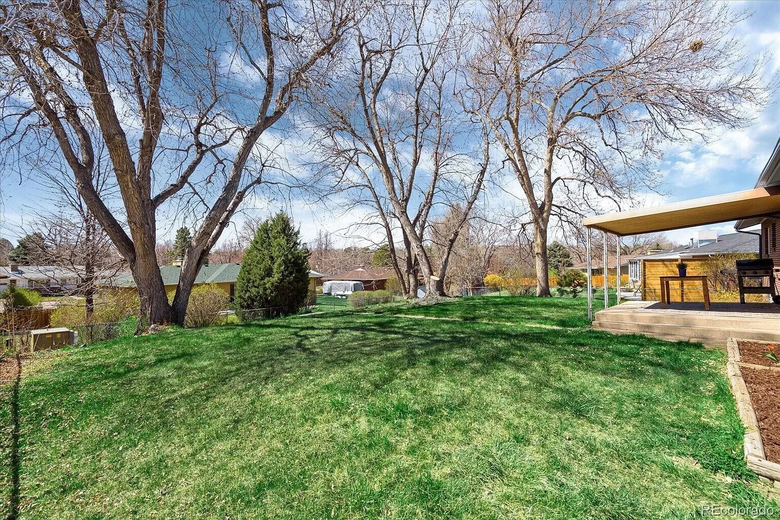 Backyard with Mature Maple Trees - 7896 E Jefferson Pl