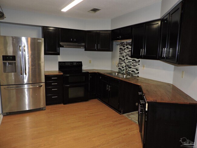 Building Photo - 7663 Charter Oaks Dr