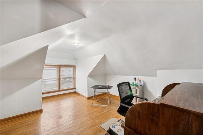 Building Photo - Bright and Roomy 6-Bedroom in McKees Rocks with Garage