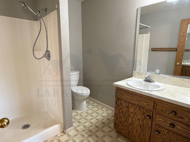 Building Photo - Single-Level 3-Bedroom Townhome with Primary Suite & Attached Garage