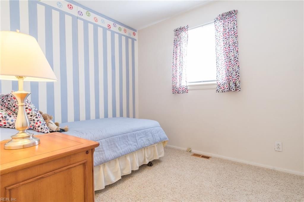 carpet has been removed and hardwood floors finished, painting in progress (shown in later pictures). - 301 Pepper Mill Ct