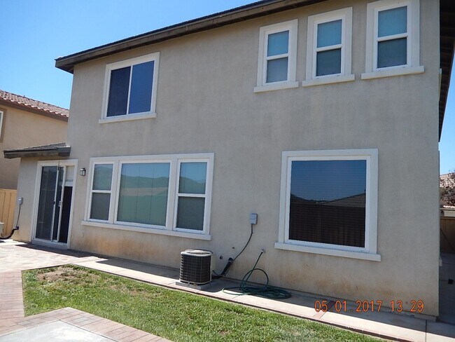Building Photo - Two story, 2750 Sq Ft home with three car ...