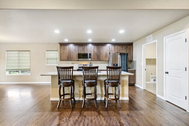 Building Photo - Stylish Cordera Ranch with Finished Basement, Gourmet Kitchen, and Ideal D20 Location