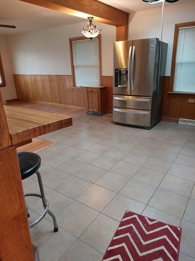 Building Photo - Corner lot with fenced in backyard!