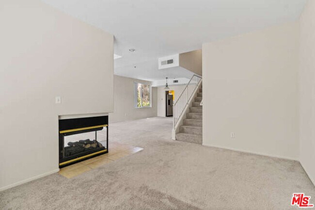 Building Photo - 10790 Rose Ave
