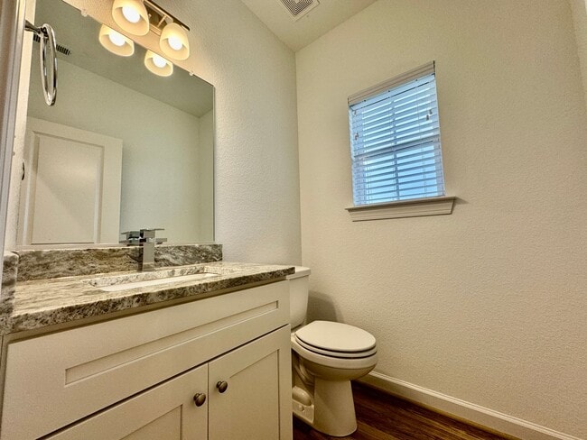 Building Photo - Practically New & Available NOW! Americana Luxury Townhomes! Pet Friendly! Attached Garage! All A...