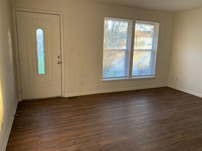 Building Photo - 3 bedroom & office -2 baths -2 car carport - washer/dryer hook ups - Den and formal living room- ...