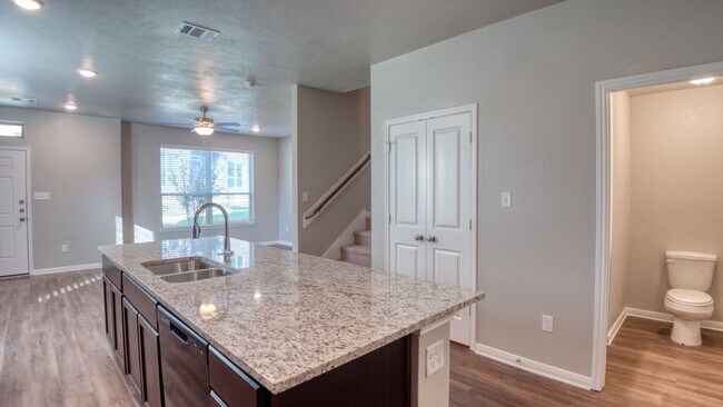 Building Photo - Live, love, and grow in this charming townhome!