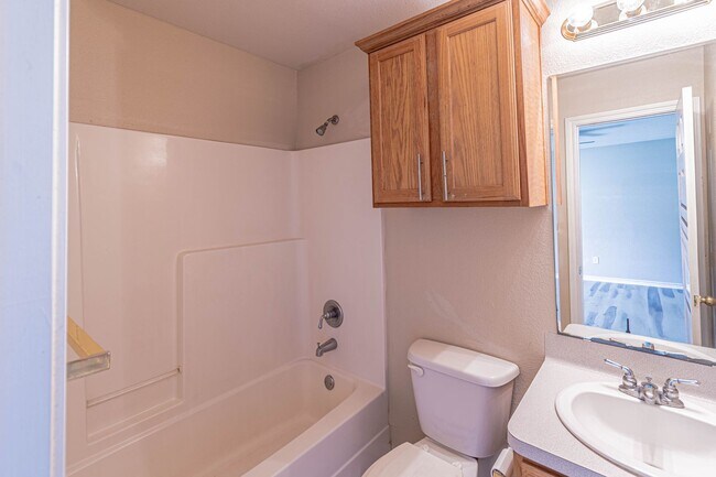 Building Photo - Available for January Move in! 3 Bedroom 3 Bathroom Duplex with Fenced Yard!