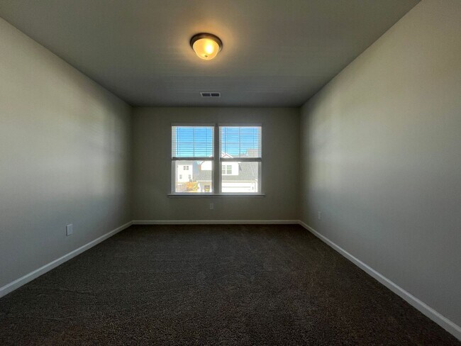 Building Photo - New 4/3 Townhome Available Now