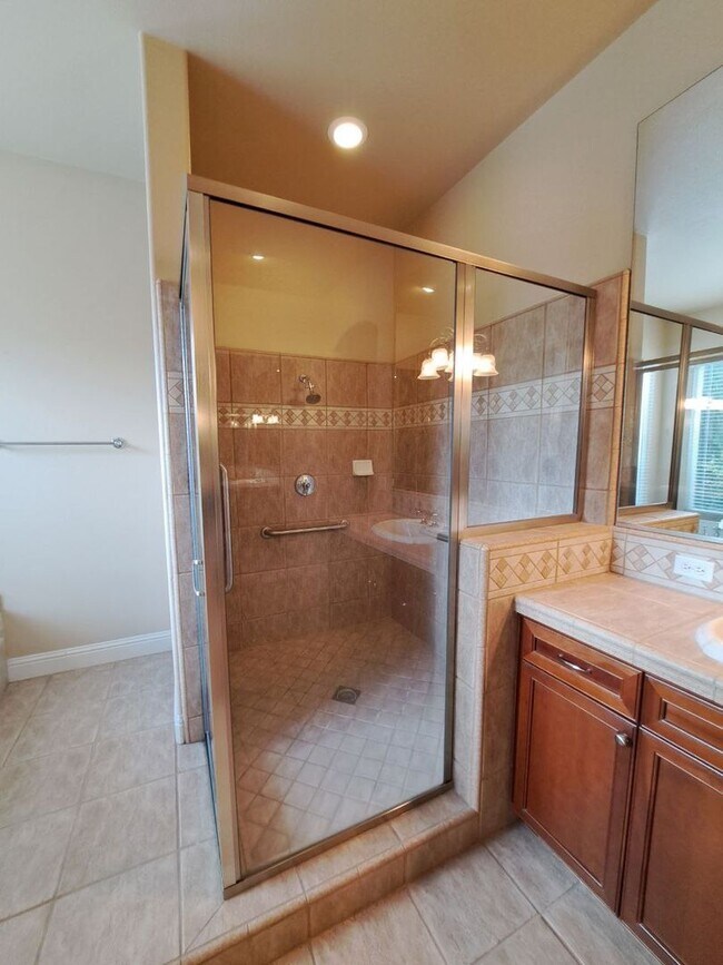 Building Photo - PRICE REDUCED TO $3795 – Custom Clovis Residence in Gated Community | Spacious Layout & 3-Car Gar...