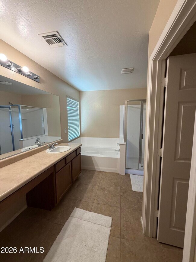 Building Photo - 4723 W Gelding Dr