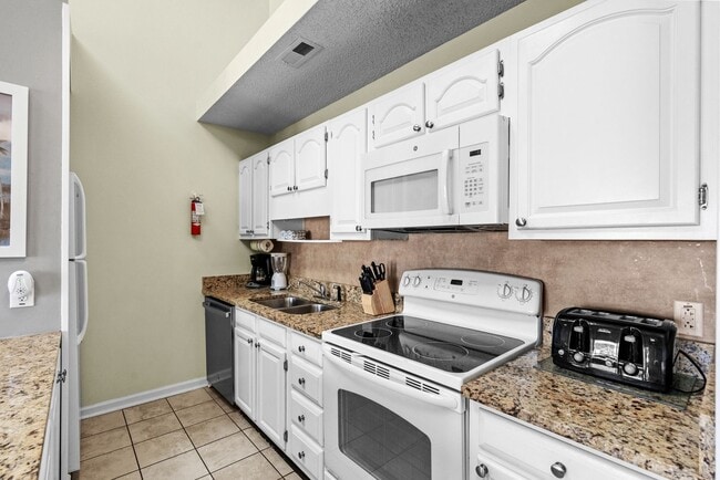 Building Photo - All Inclusive Seasonal Rental in Grand Pal...