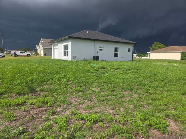 Building Photo - BRAND NEW 2/2/1- SW LEHIGH ACRES