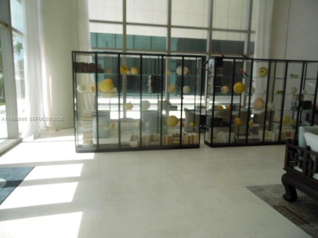 Building Photo - 10203 Collins Ave